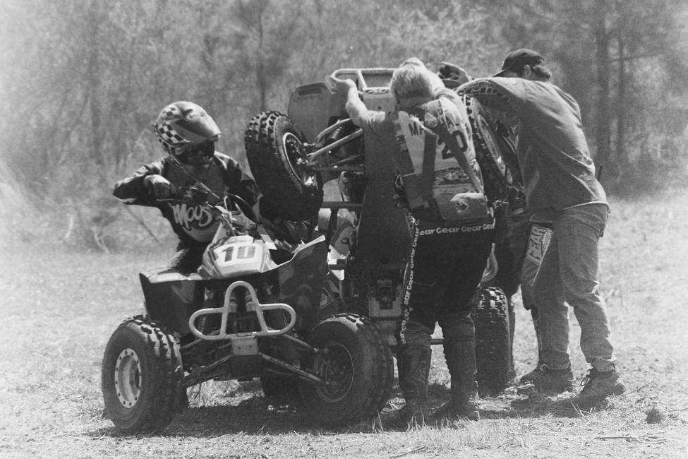 This comes from the start of the first-ever Big Buck GNCC in 1997. Number 10 is Steve Holbert and the quad they're lifting off of him is actually Bill Ballance!