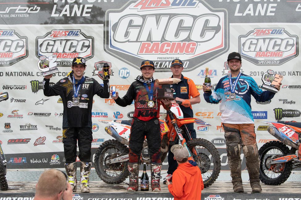 Kailub Russell (center), Thad Duvall (left) and Steward Baylor Jr. (right) rounded out the previous round overall podium. 