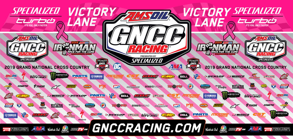 The Ironman GNCC pink backdrop will be auctioned off Saturday evening.