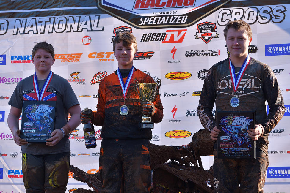Tyler Cox (center), Nicholas Dearing (right) and Ty McGaughey (left) made up the ATV Youth top three overall.&nbsp;