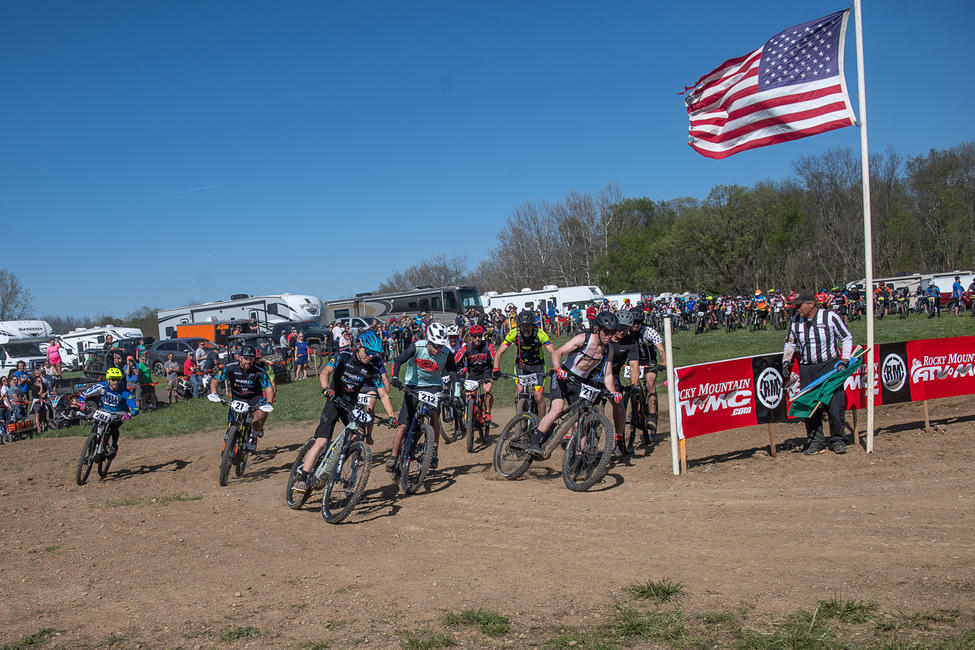  Albert Haberk (218) squeezes by on the inside after the start of the Amateur race, with Ty Teasdale (212) and Canon Kuneff (26) in hot pursuit. Photo: Shan Moore