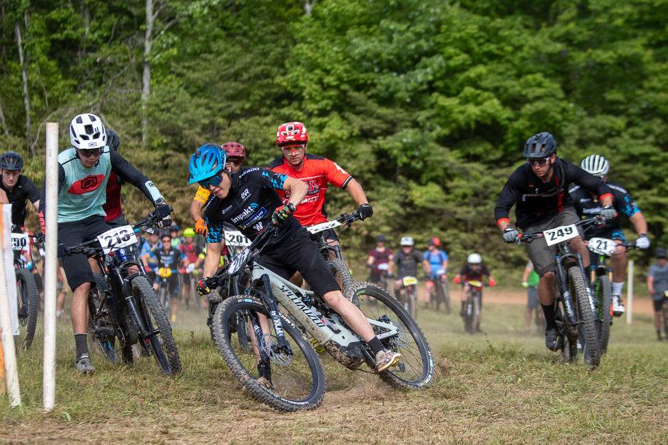 Canon Kuneff leads the Amateur class into the first turn. Kuneff eventually finished ninth in class. Photo: Shan Moore