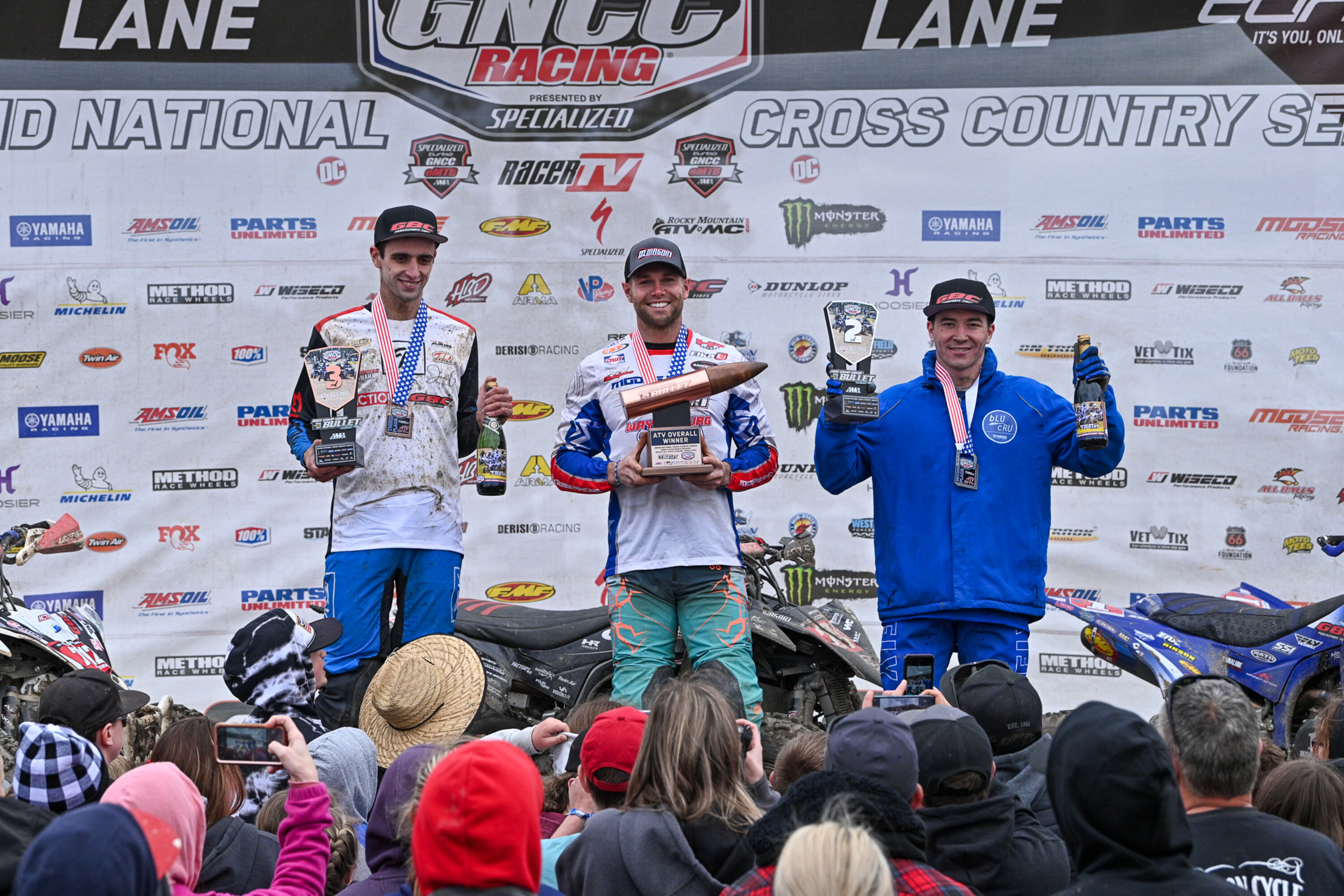John Glauda Jr. (left) made his first podium appearance at Camp Coker