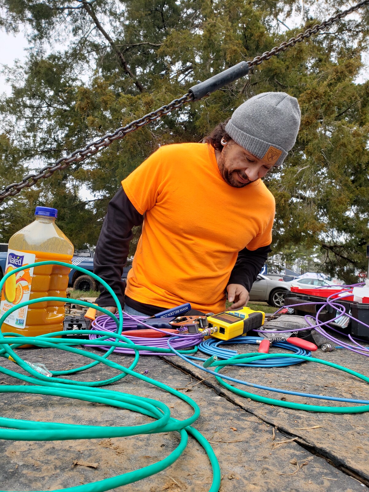 Dan working to get the wiring together at a GNCC event.