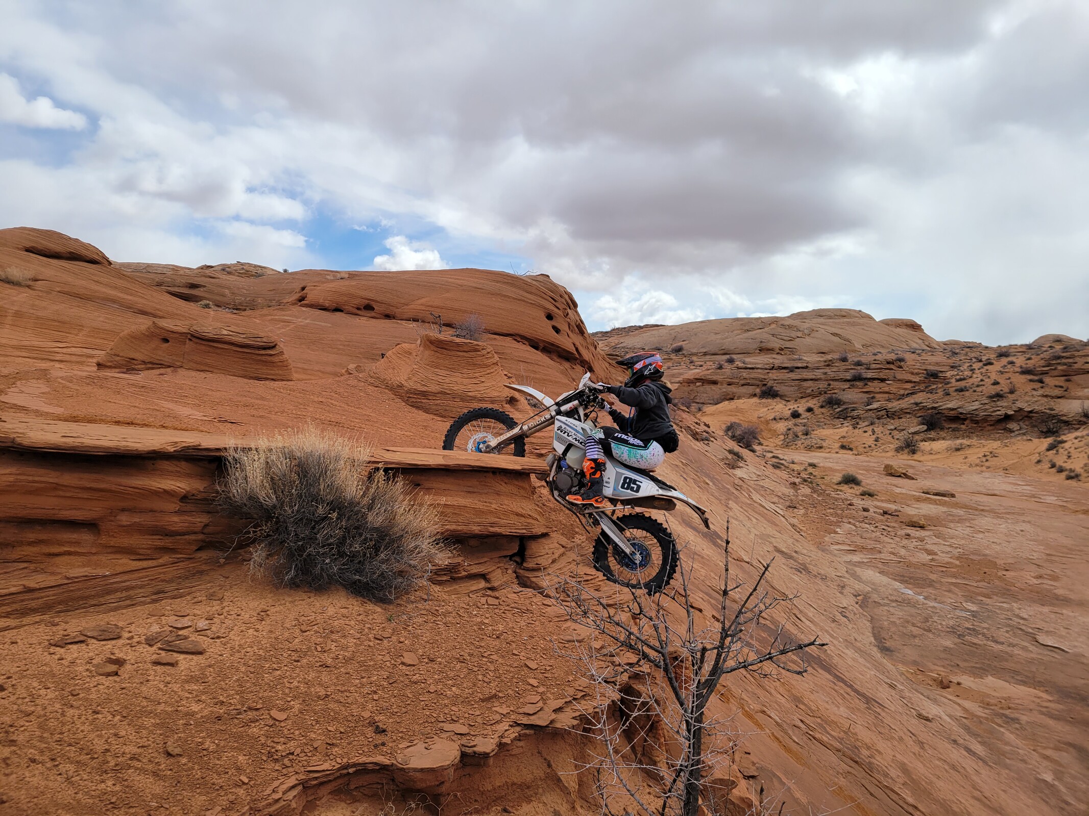 WXC racer Taylor Johnston tackling some of the rock sections of the White Wash Sand Dunes in Utah.