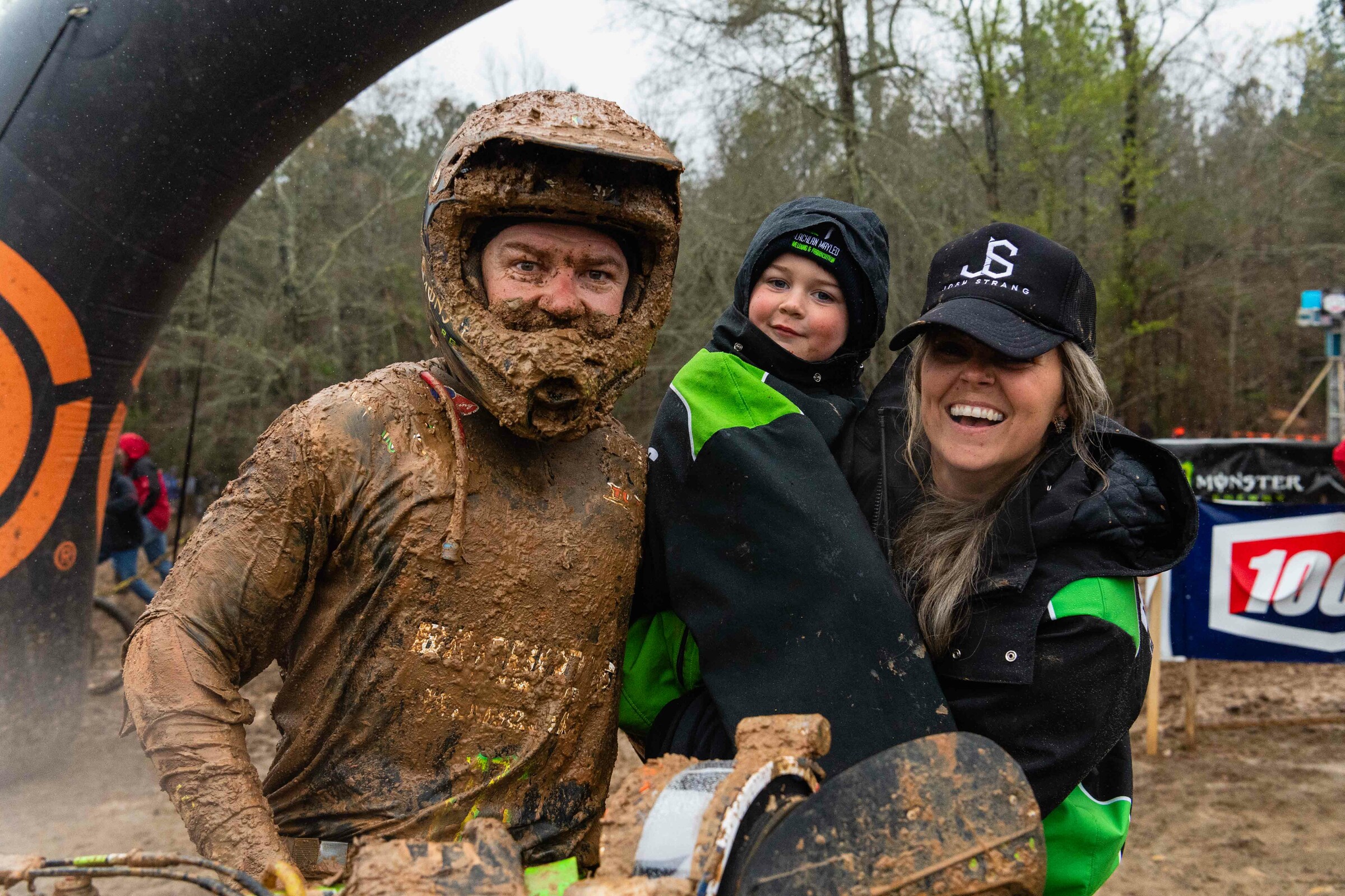 Cameron with Josh and Maverick after a very muddy race this season.