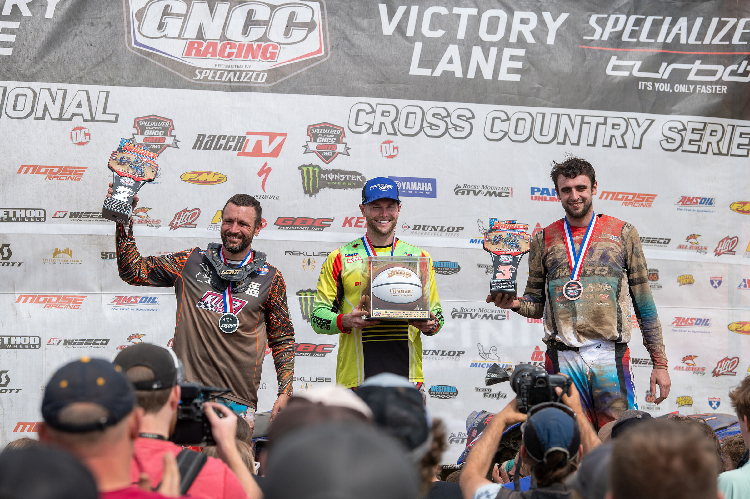 Brycen Neal (center), Adam McGill (left) and John Glauda (right) rounded out the top three AMSOIL Hoosier finishers.