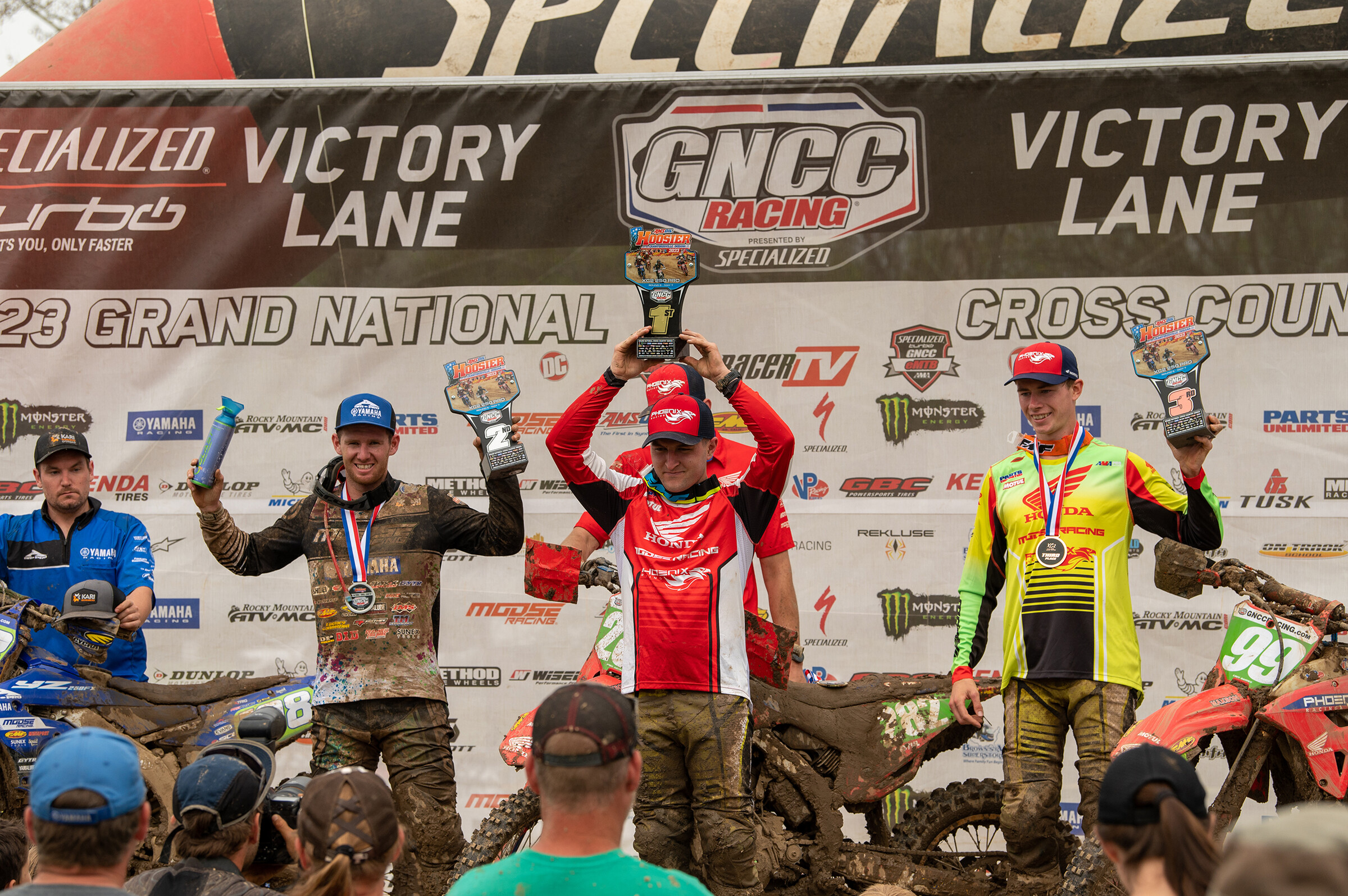 Michael Witkowski (center), Liam Draper (left) and Cody Barnes (right) rounded out the top three XC2 250 Pro finishers at round six.