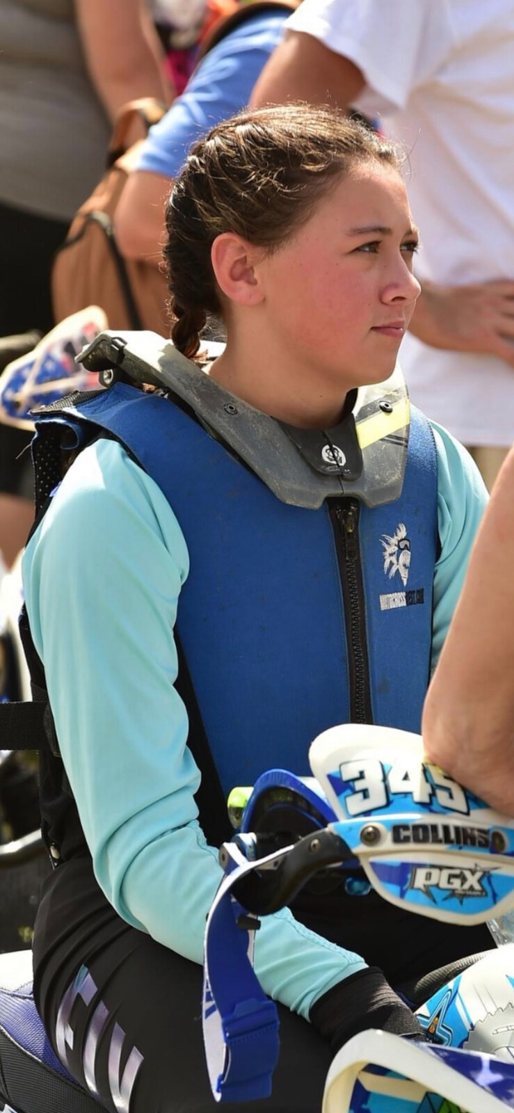 Avery waiting to fully gear up on the starting line before her race.