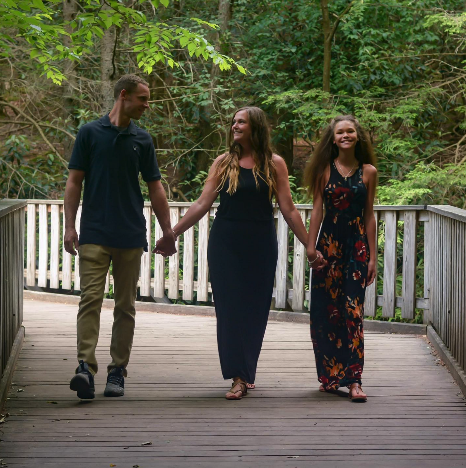 Ryan alongside his family, Athena (wife) and Ava (daughter).