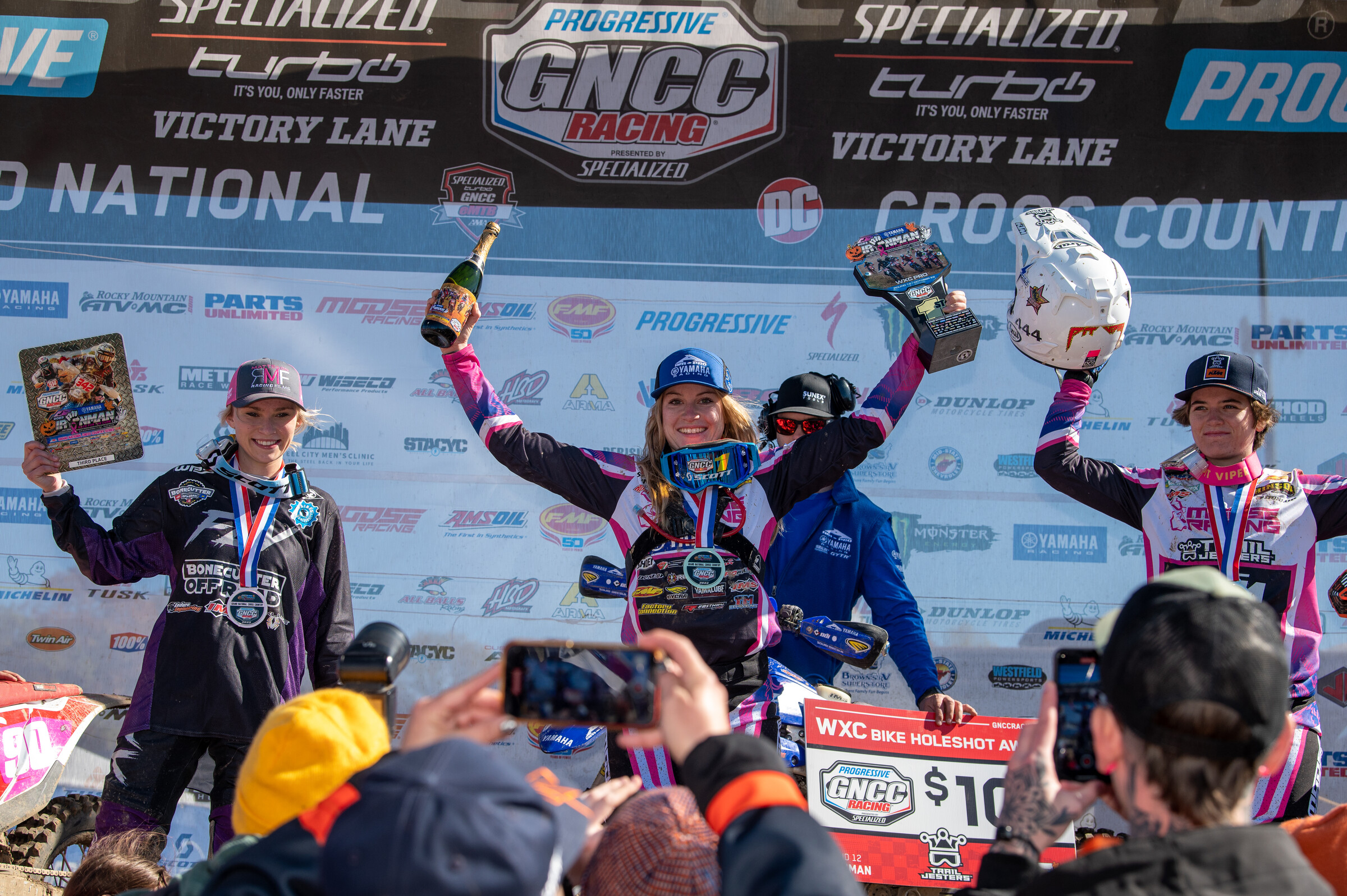 Rachael Archer (center), Korie Steede (right) and Prestin Raines (left) rounded out the top three WXC bike finishers at the Ironman GNCC.