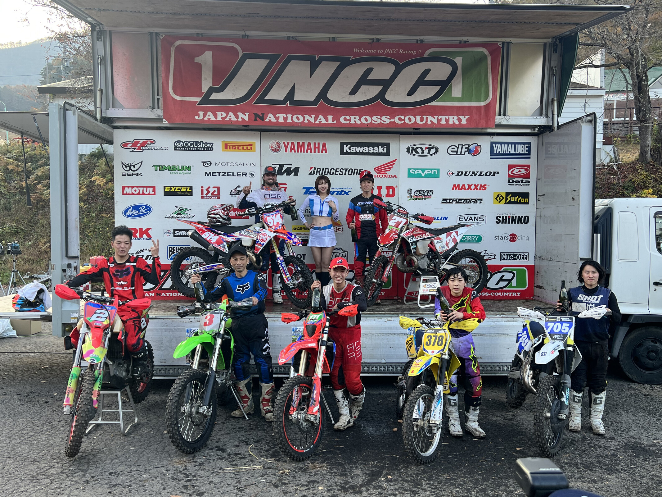 Baylor atop the podium with other top JNCC finishers.