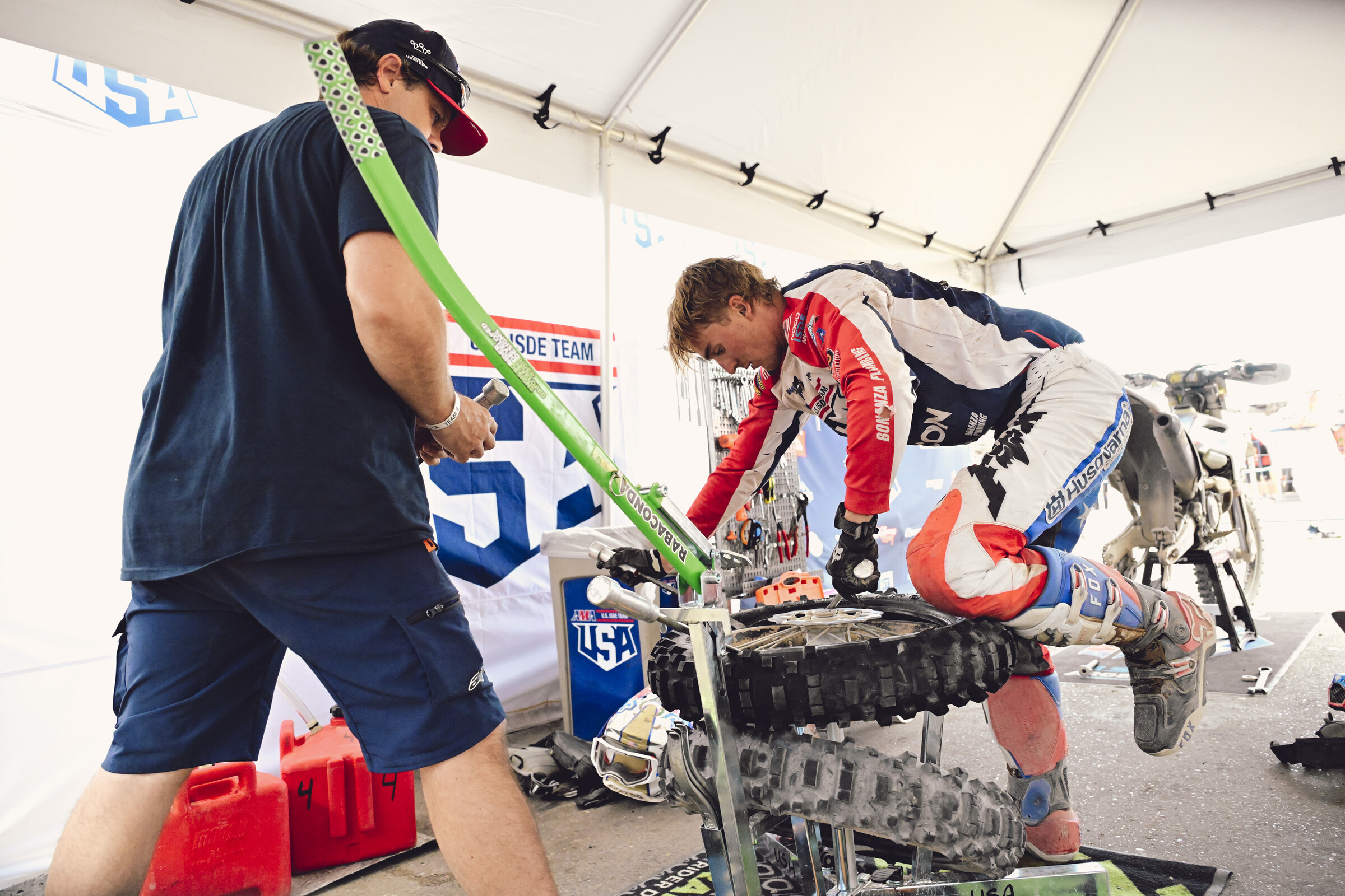 Grant Davis working on changing his tires after day 5. 