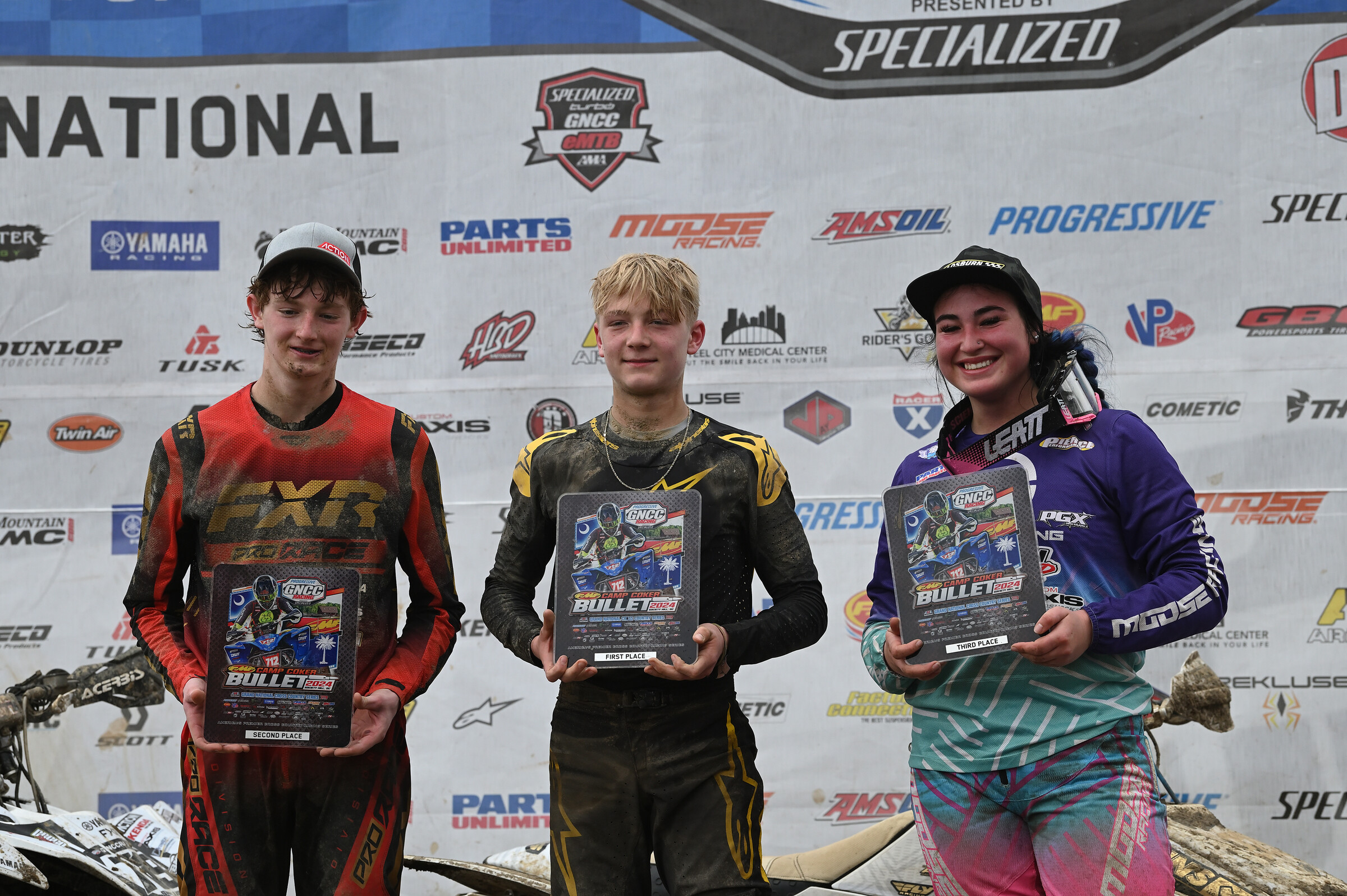 Cole Lykins (center) earned the overall win in the 11 am race, Andrew Smallwood would earn second overall and Chloe Harper finished third overall in the race.