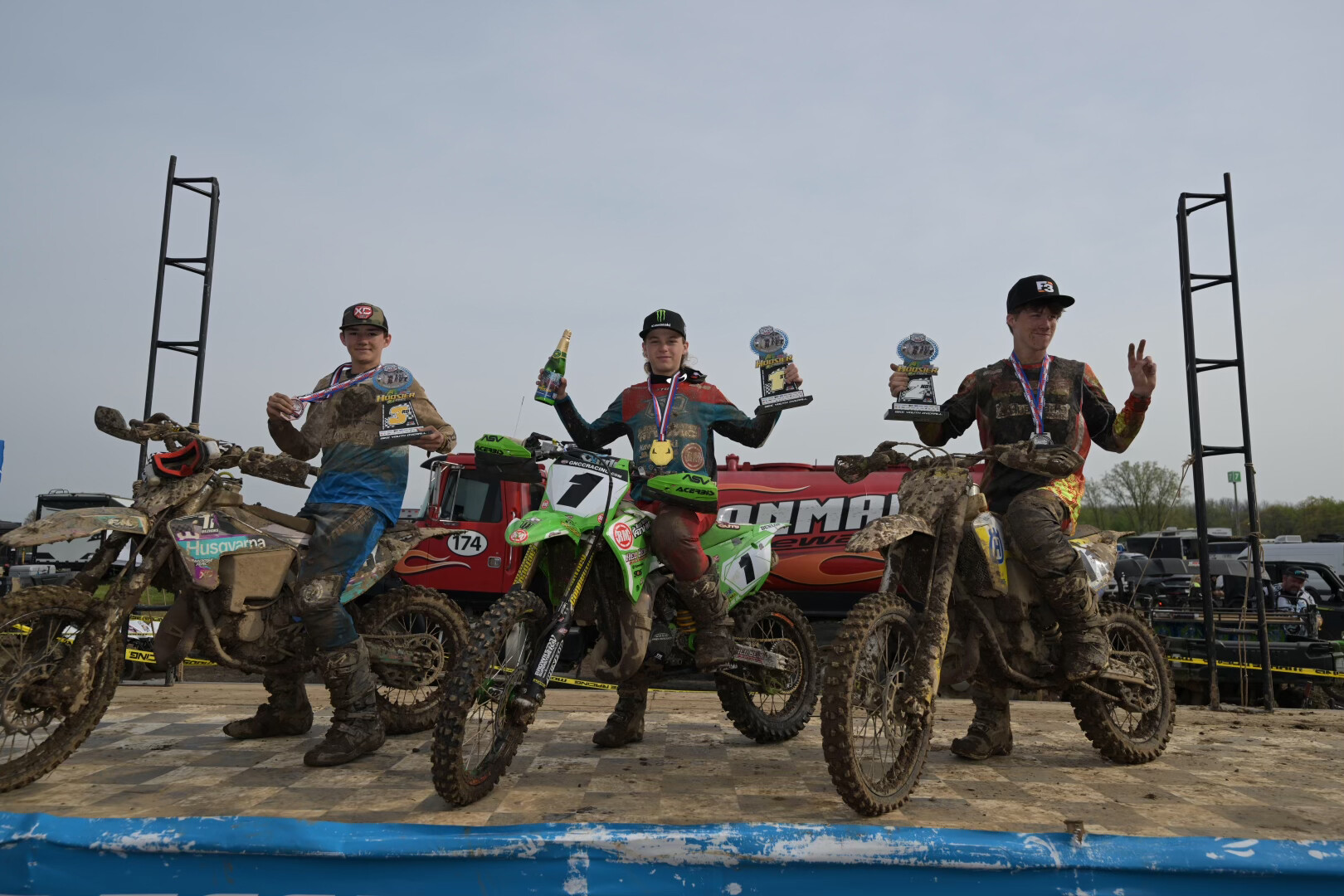 Caleb Wood (center), Brody Amos (right) and Brayden Baisley (left) rounded out the top three overall youth bike finishers.