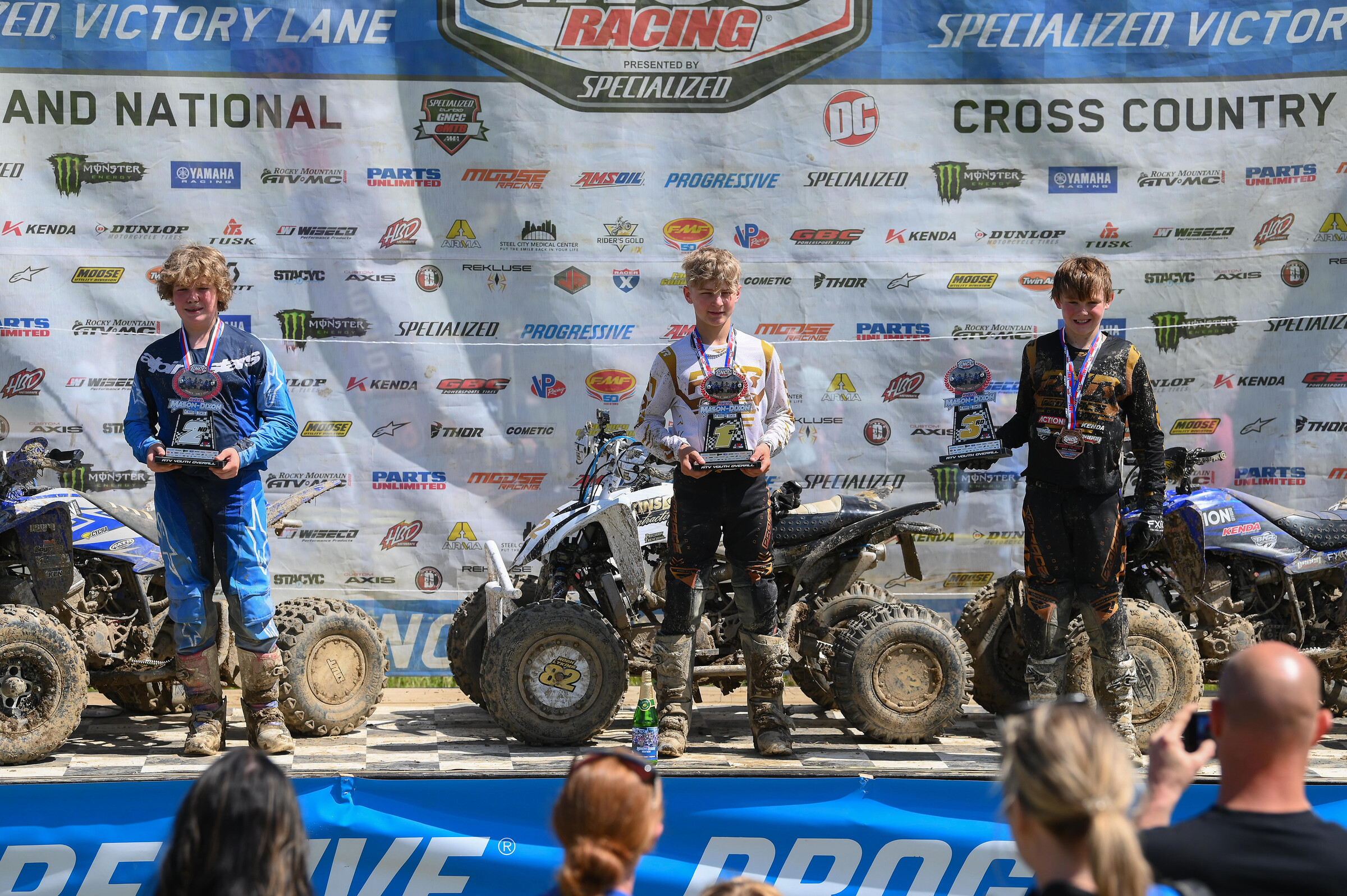 Noah Lykins (center), Stetson Owens (left) and Jacob Smallwood (right) rounded out the top three youth overall finishers.