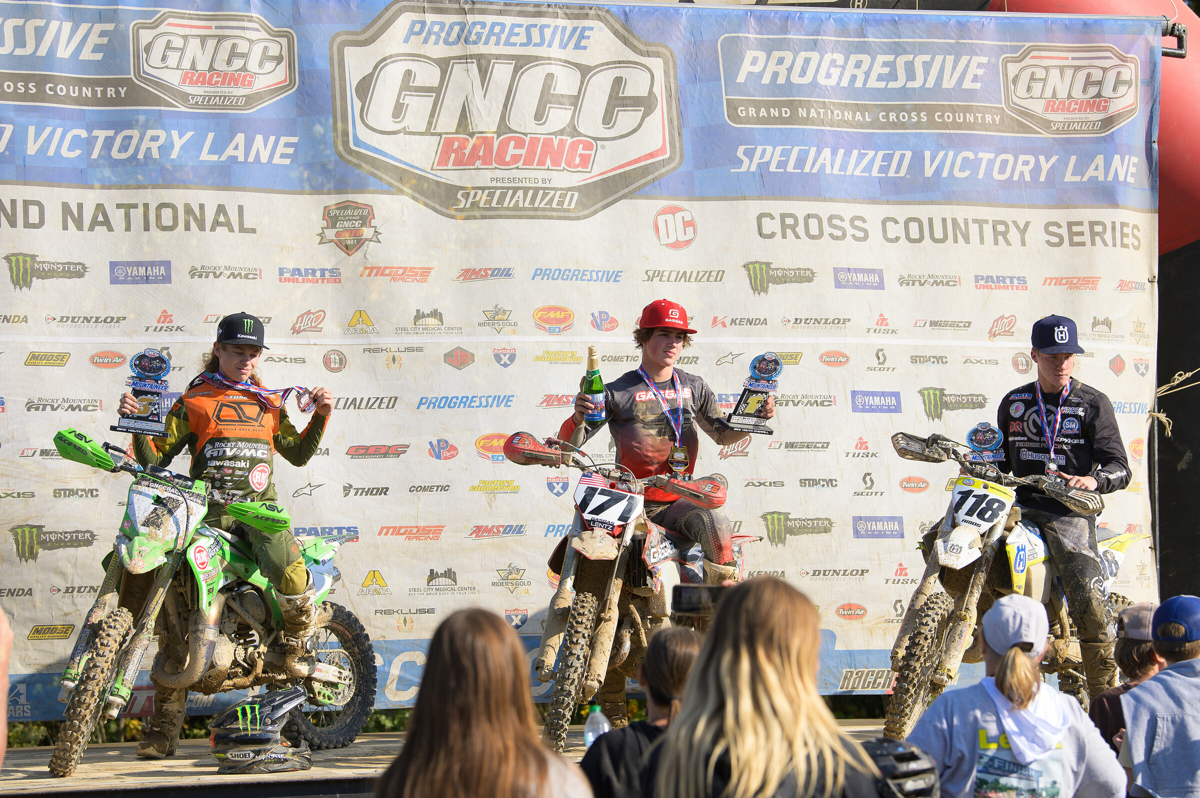 Travis Lentz (center) earned the Youth Overall win. Brody Amos (right) and Caleb Wood (left) rounded out the top three youth finishers.