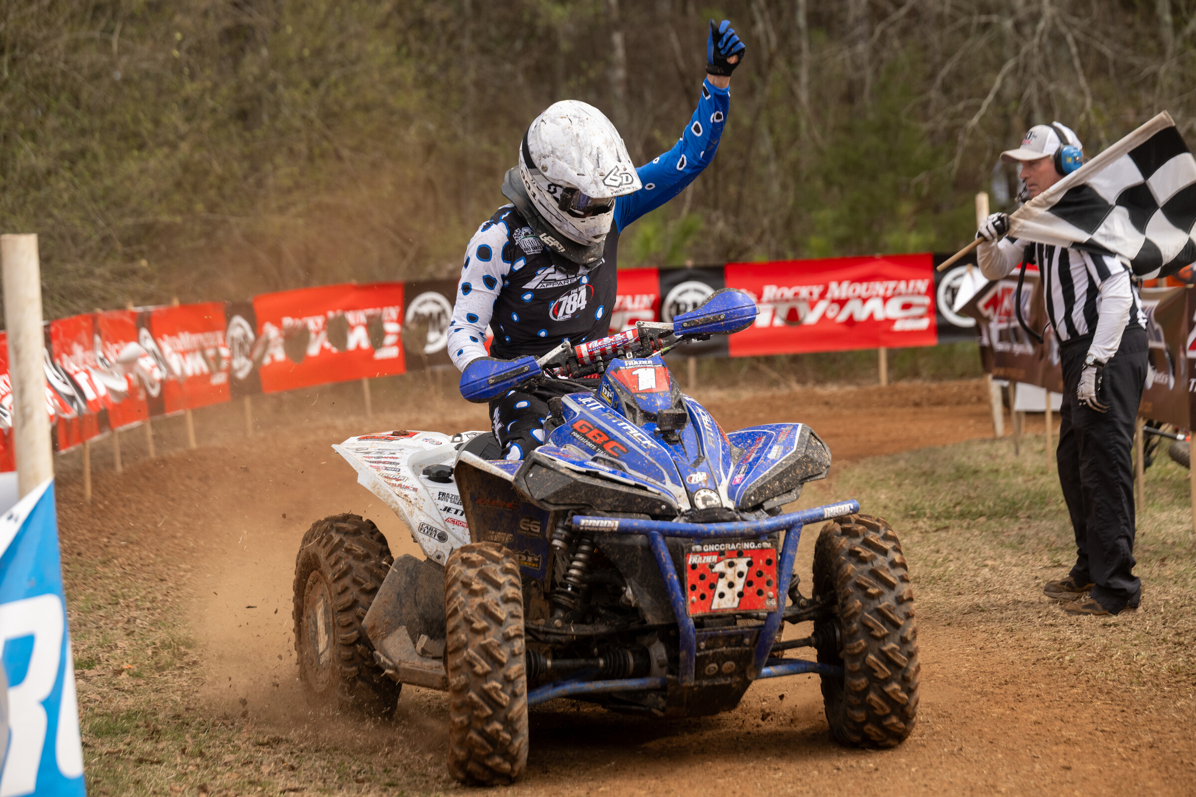 Coming through the finish line first with the fist pump.