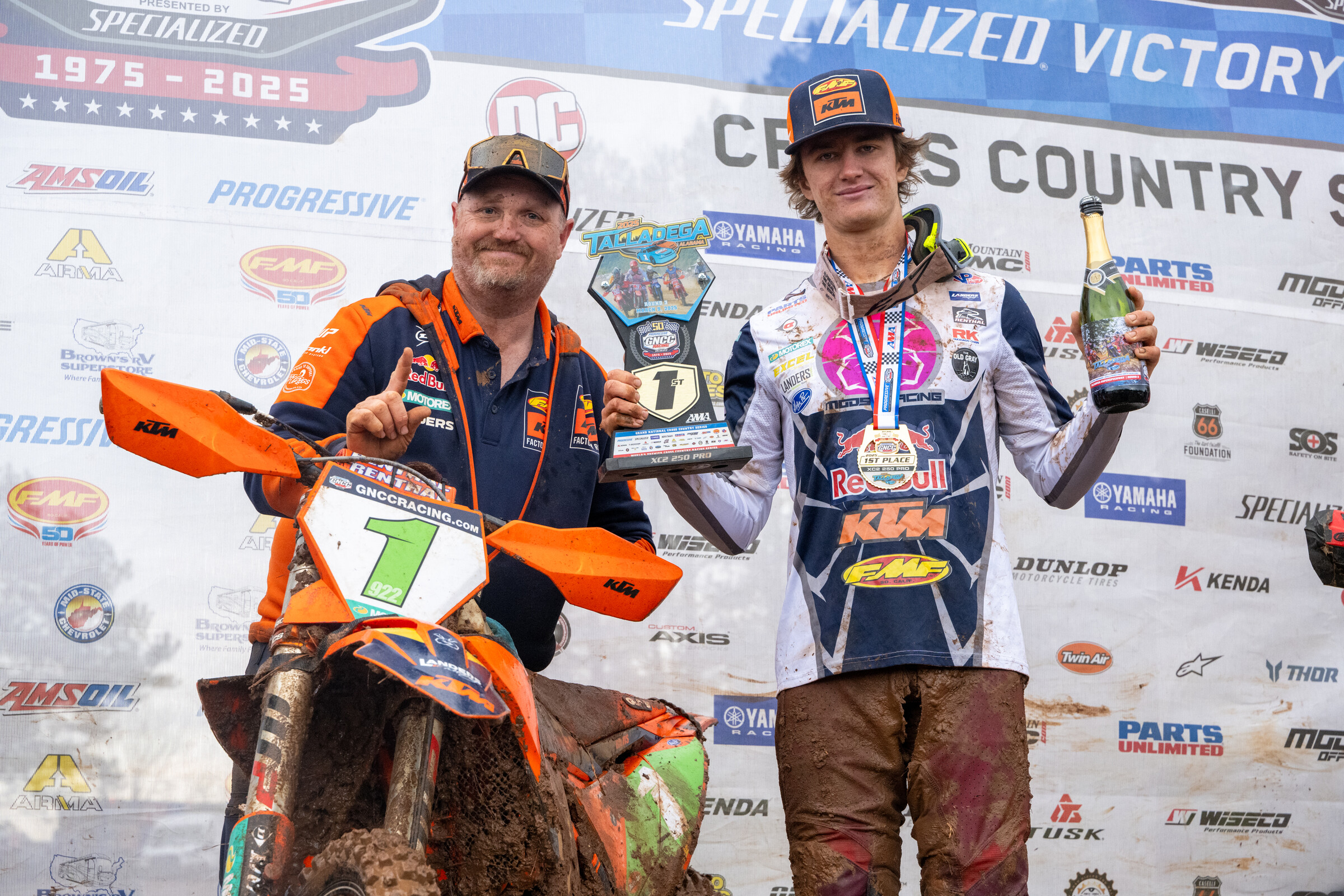 Davis up on the podium with his mechanic at the Talladega GNCC.
