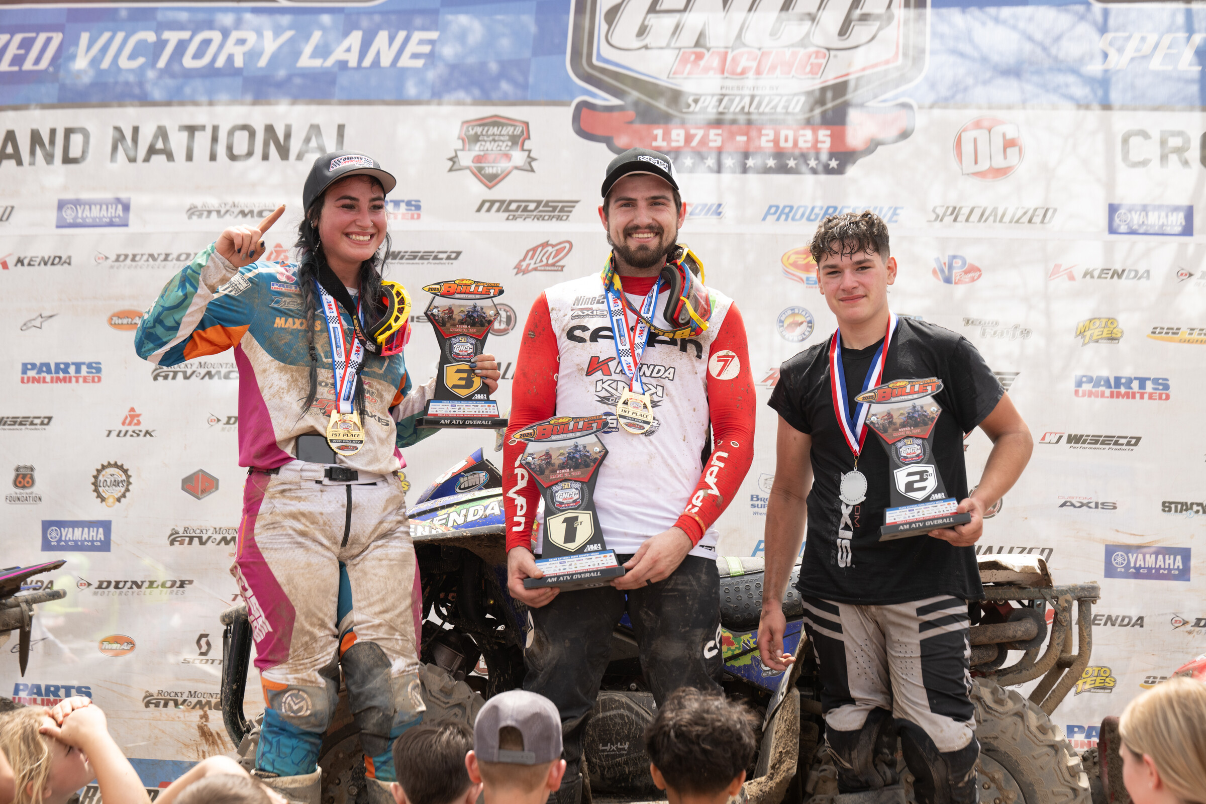 Cody Collier (center) earned the AM Overall win as well as the 4x4 Pro class win. Bryce Pullen (right) finished second overall on the day, and first in the 250 All-Star class, while Chloe Harper (left) finished third overall and earned the WXC class win.