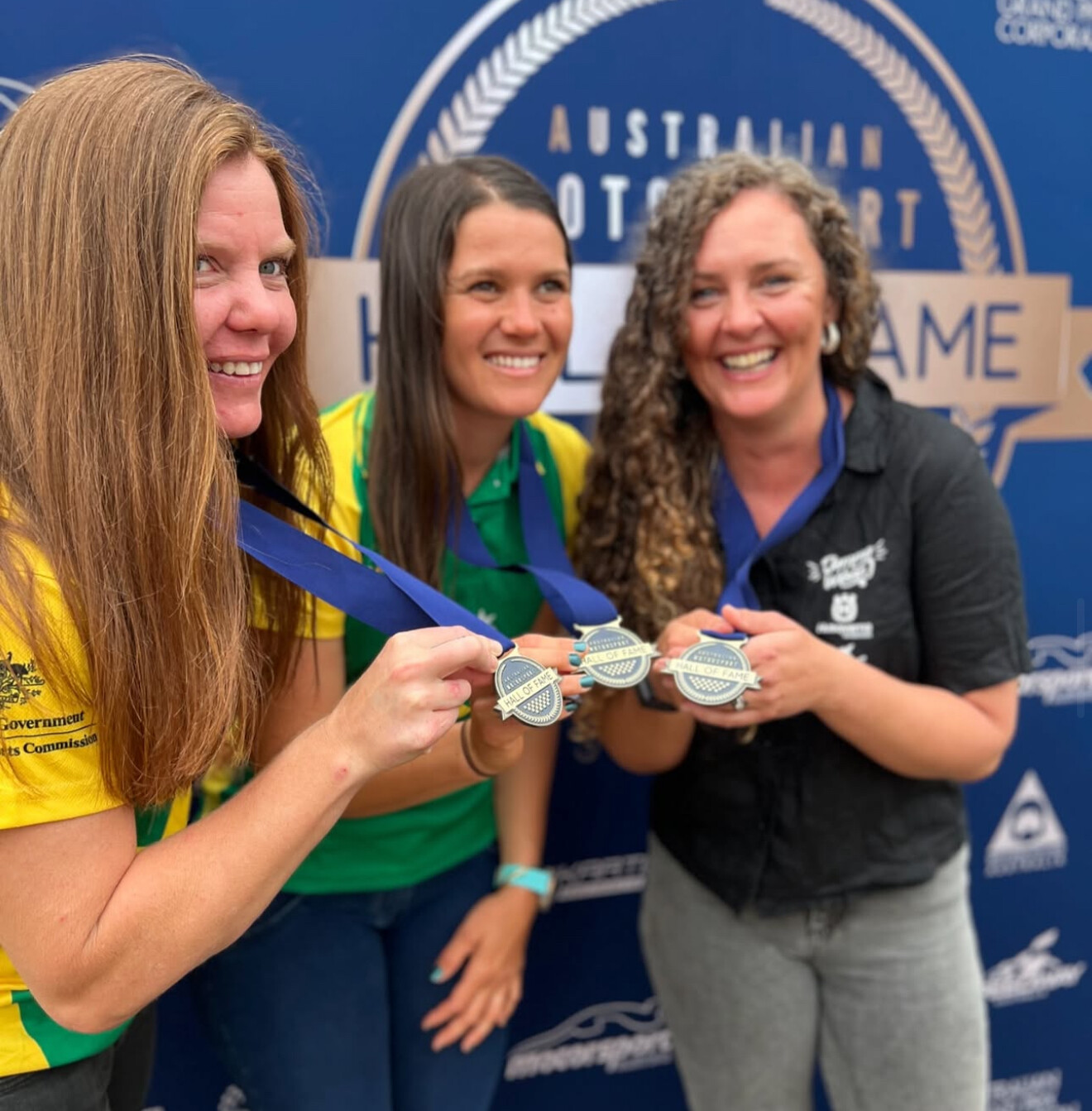 Jones alongside some other Women HOF inductees.