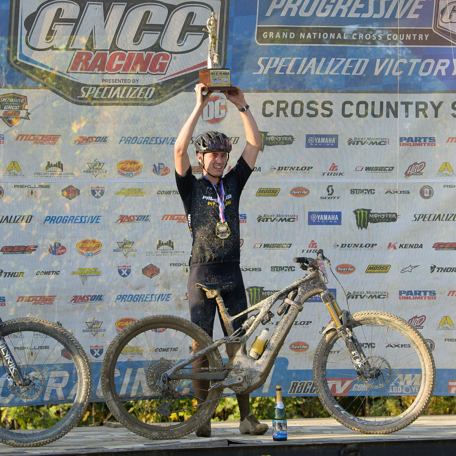 Cody on the podium after earning his first overall win at The Mountaineer in 2024.