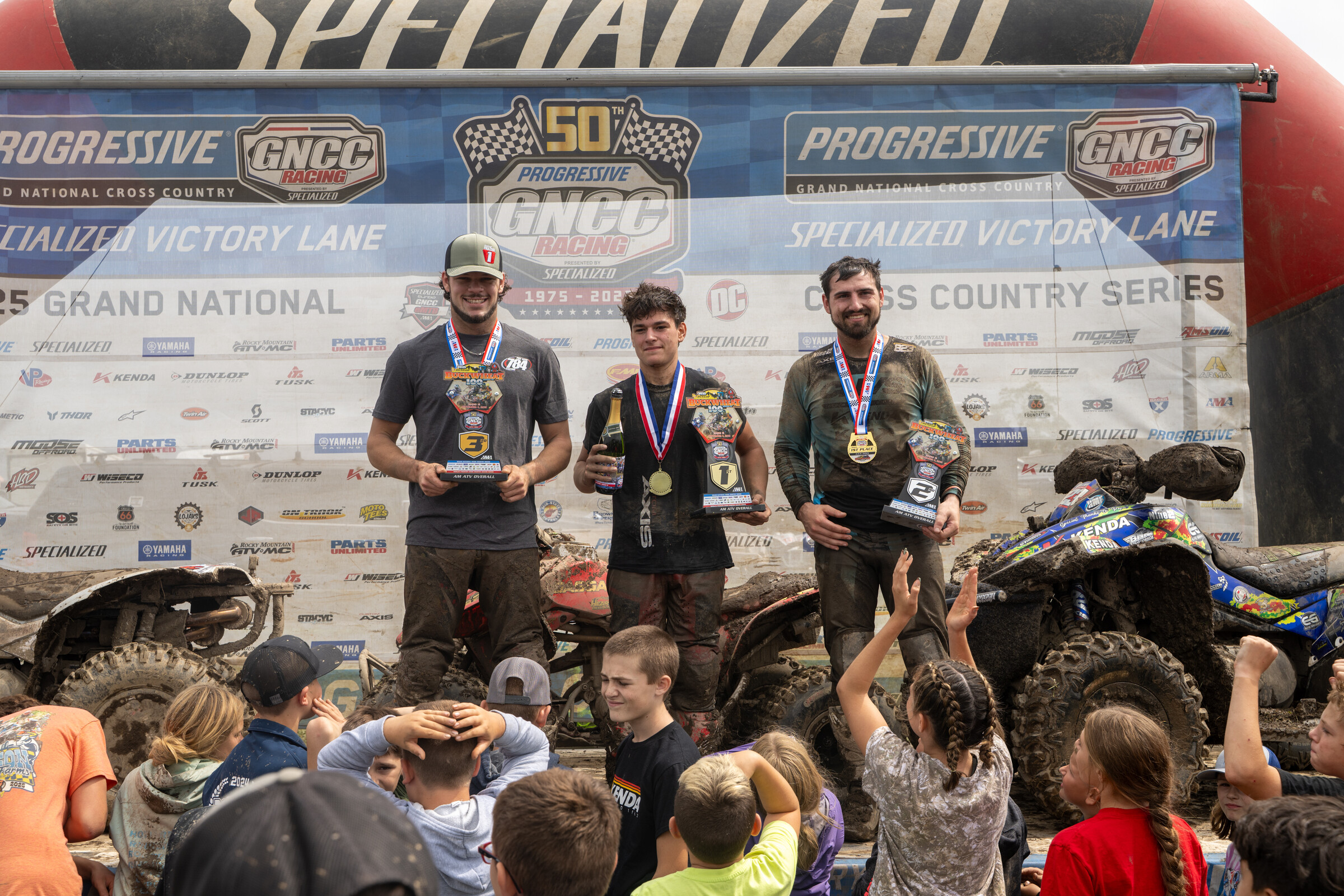 Bryce Pullen - 250 All Star (center), Cody Collier - 4x4 Pro (right) and Brandon Frazier - 4x4 Pro (left) rounded out the top three AM ATV race overall finishers on the day.