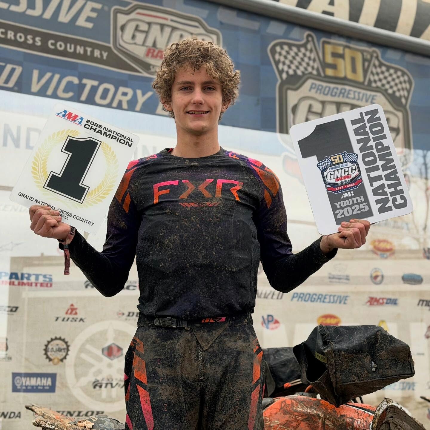 Bodie atop the podium with his ATV Youth Overall National Championship plates.