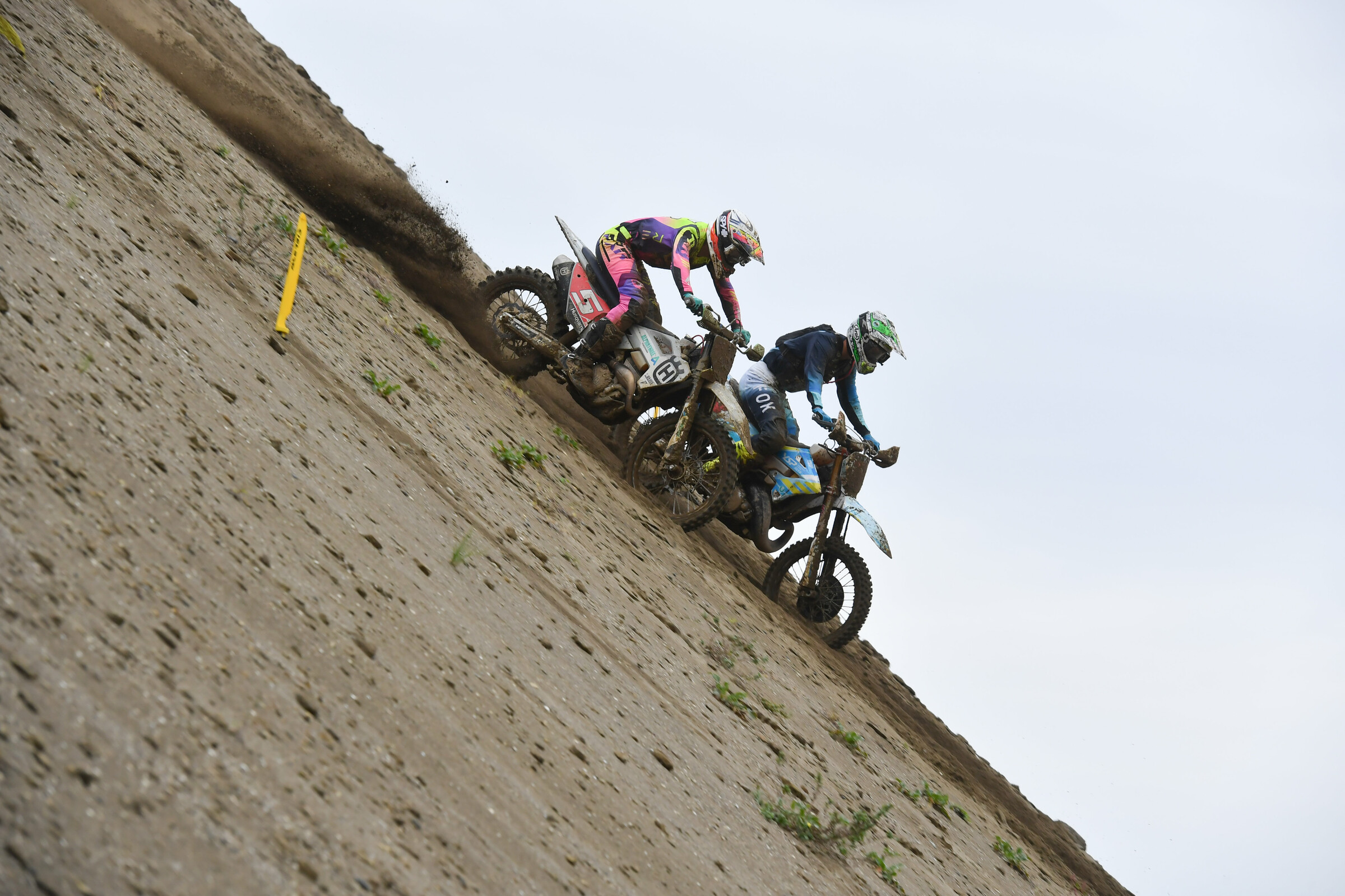 Second place finisher Masahiro Kobayashi battles with Ryota Suzuki