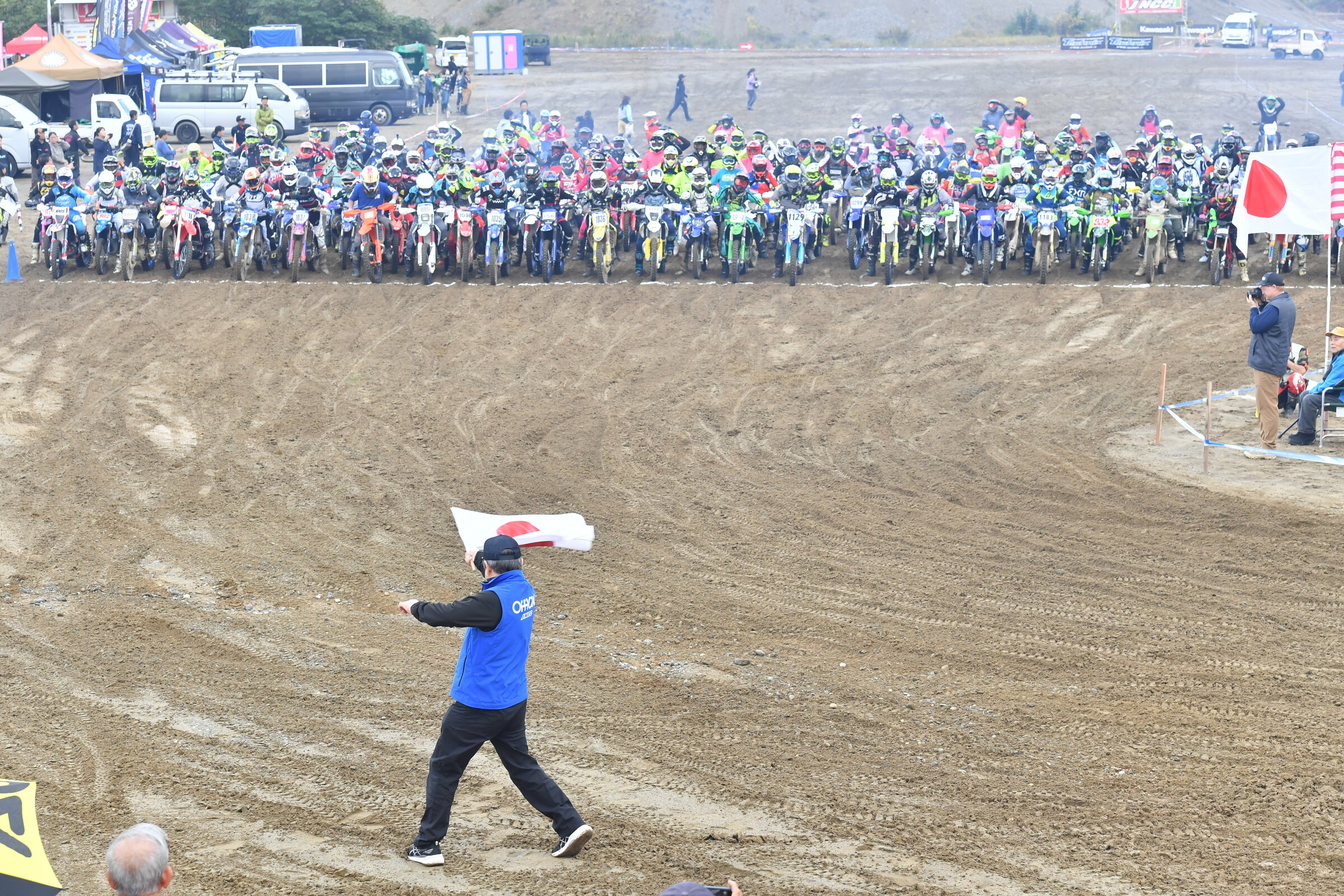 Masami Hoshino waves the flag for the 