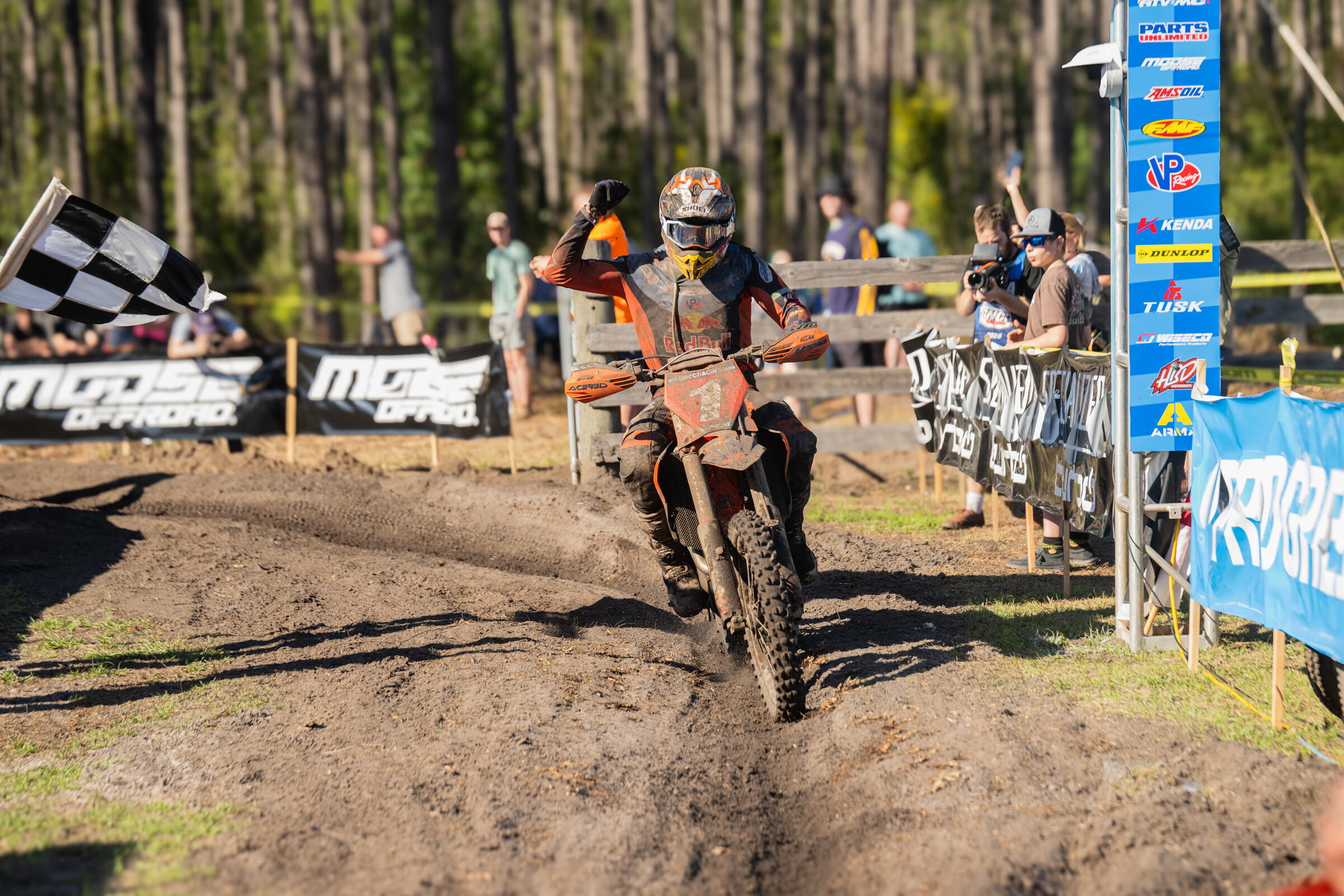 Ben Kelley (FMF KTM Factory Racing) powers across the finish to claim the overall win at the Wild Boar GNCC in Palatka, Florida, mastering the brutal sand and technical terrain to take top honors in the afternoon Pro race.