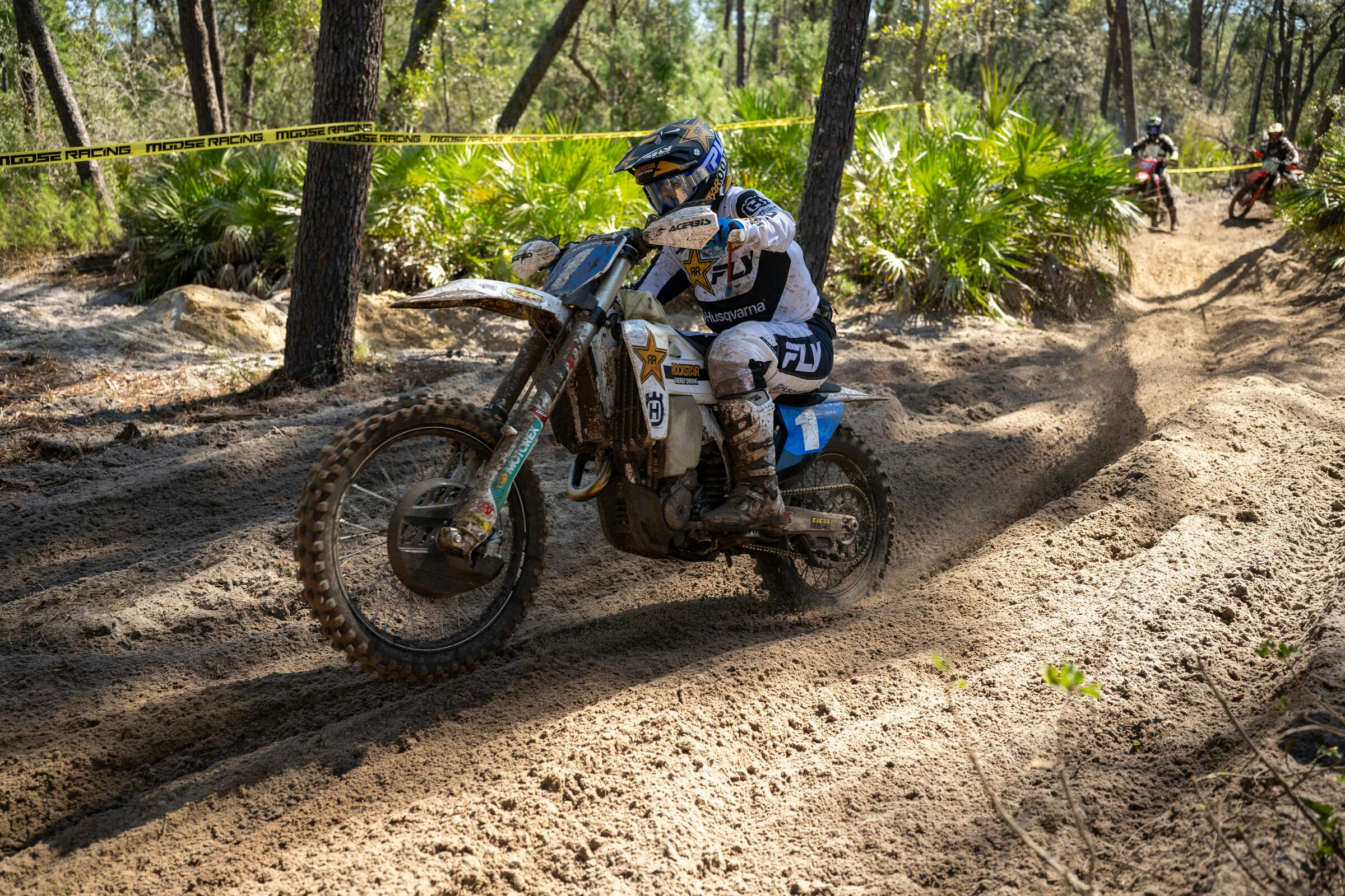 Korie Steede would battle back through the sandy Florida terrain to finish second.
