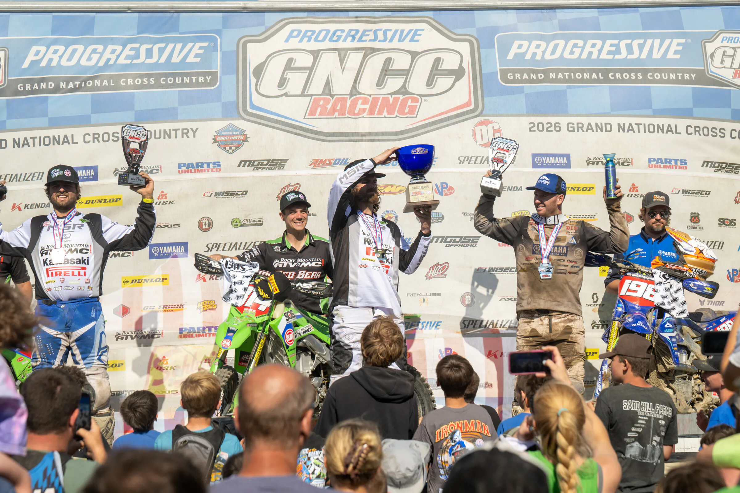 AMSOIL Watkins Glen International GNCC Top Three Finishers: Grant Baylor (center), Liam Draper (right) and Steward Baylor Jr. (left).